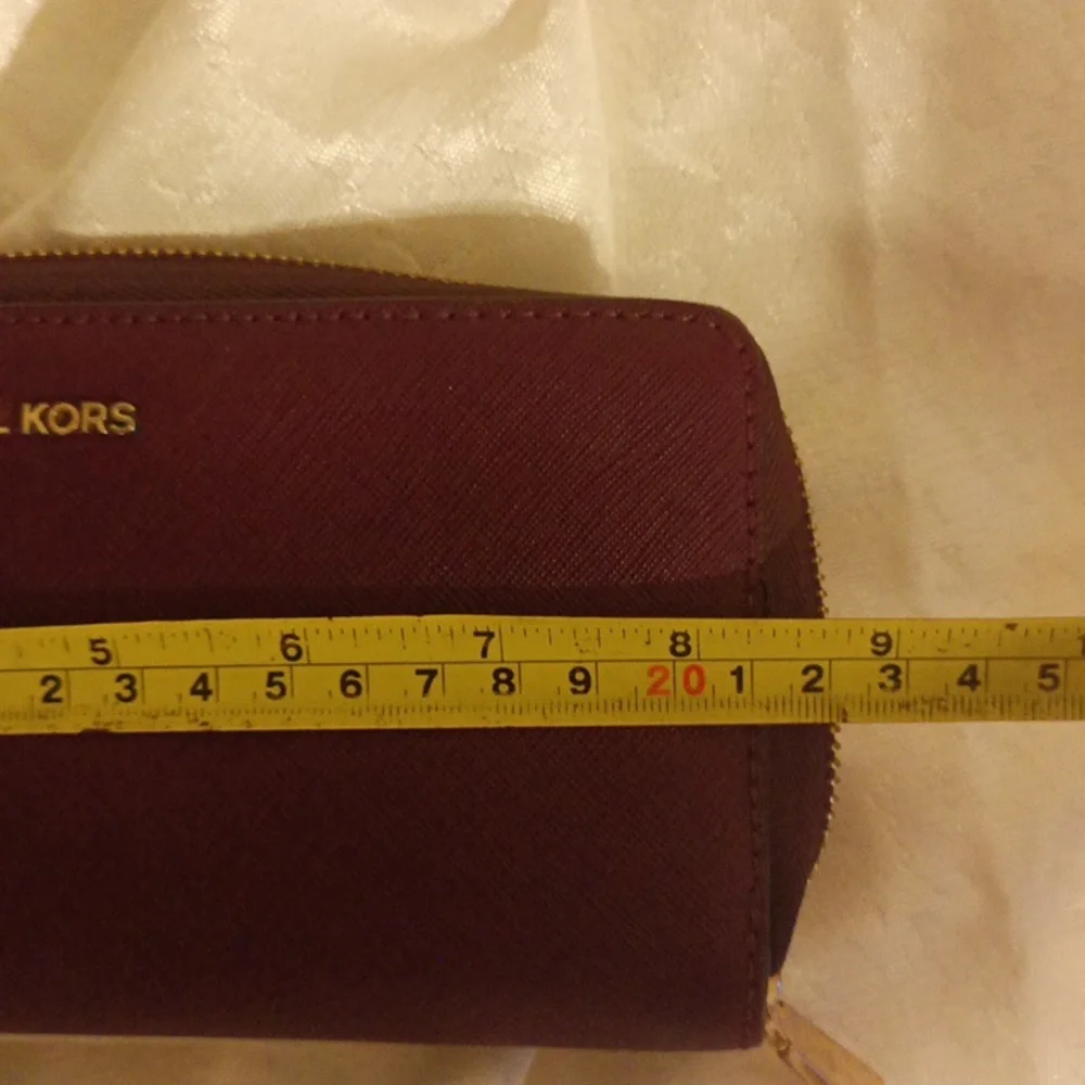 Michael Kors large Saffiano burgundy color leather accordion wallet/ wri…
